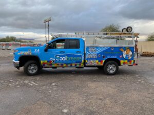 Cool Breeze Comfort Solutions truck parked in parking lot